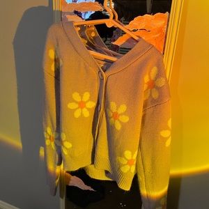 Purple cardigan with daisies